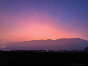 beautiful pink sunrise over saleve mountain near geneva switzerland