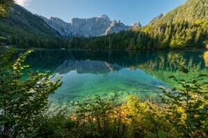 early autumn morning at the fusine lake