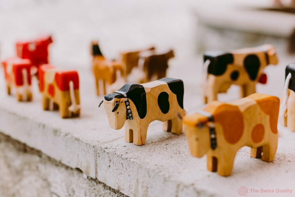 wooden cow souvenirs in switzerland