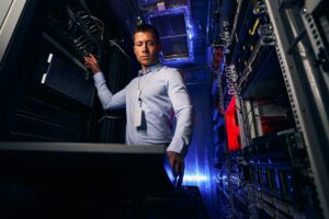 Data center engineer setting up network infrastructure - Network Administration for Modern Businesses